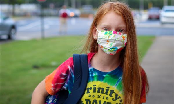 student smiles on first day of school